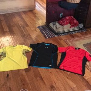 Men’s Under Armor shirts. Mediums